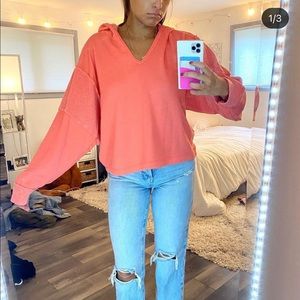Bright orange sweatshirt
